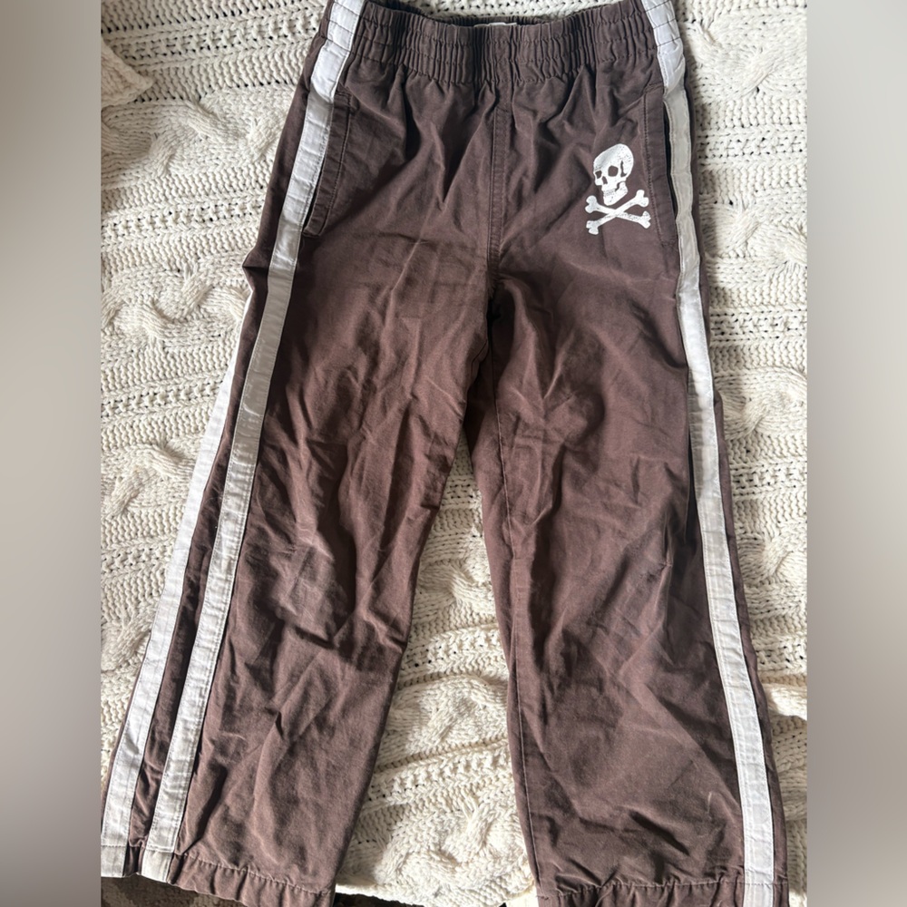 VINTAGE Brown Track Pants with Side Stripe and Skull/Crossbones Graphic